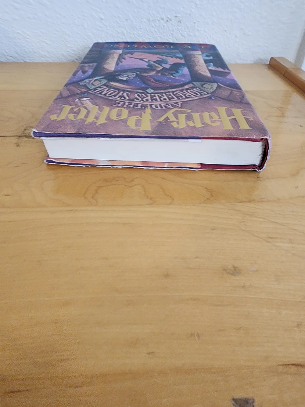 Harry Potter and the Sorcerer's Stone by J.K. Rowling - Purple Cover